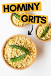 one large bowl and two small bowls of hominy grits topped with grilled serrano peppers and a text overlay that reads "hominy grits" with an arrow pointing toward the big bowl